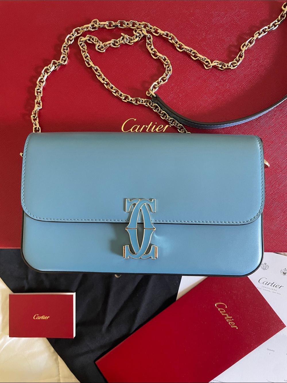 Cartier Blue Leather Crossbody with Gold Chain and Double C Emblem